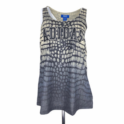 Adidas 10$ to 25$
18&quot; Chest
28&quot; Length
Active Top
Adidas
Beige
Black
Excellent Condition
Size Large
Sleeveless Top
Snakeskin Print
Tops
W0033-1289
Women